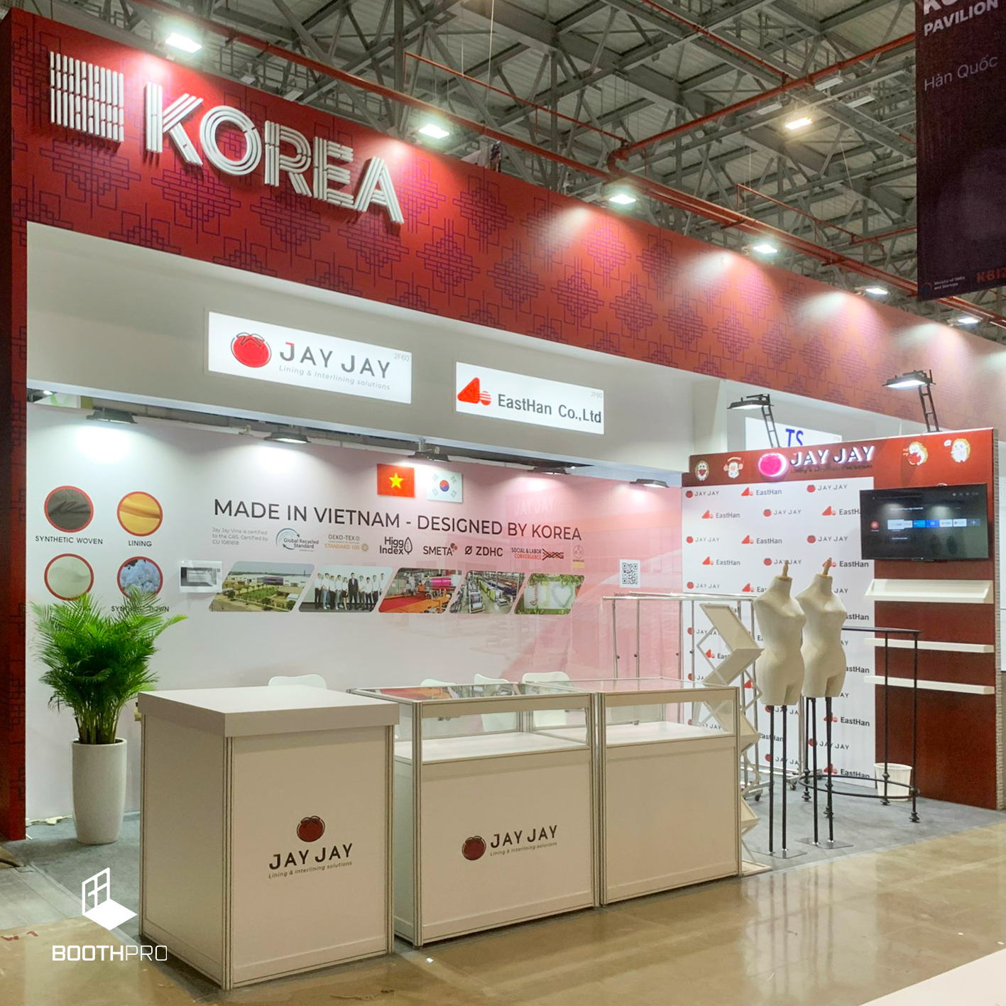 thi cong gian hang trien lam may mac